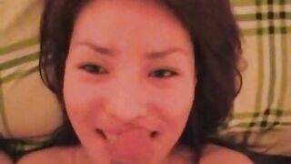 Asian girl delivers a homemade blowjob with passion